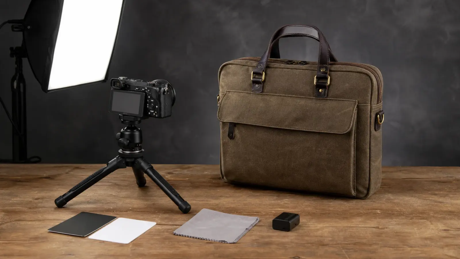 A rugged premium briefcase beside a compact product-video kit