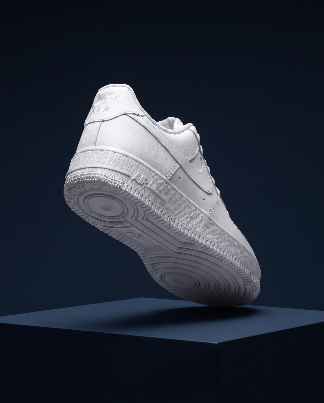 A footwear image composed to make heel and outsole construction visible.