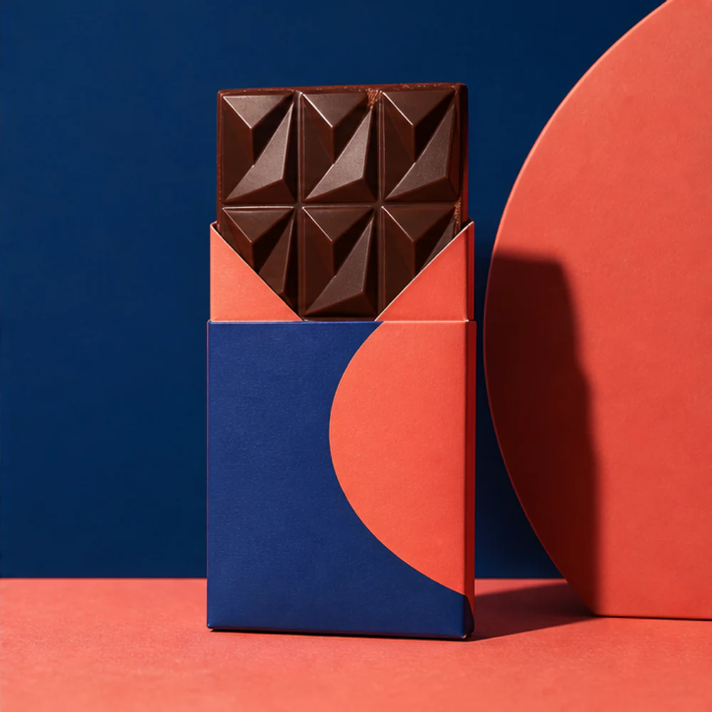 Chocolate bar packaging presented in a graphic campaign layout.